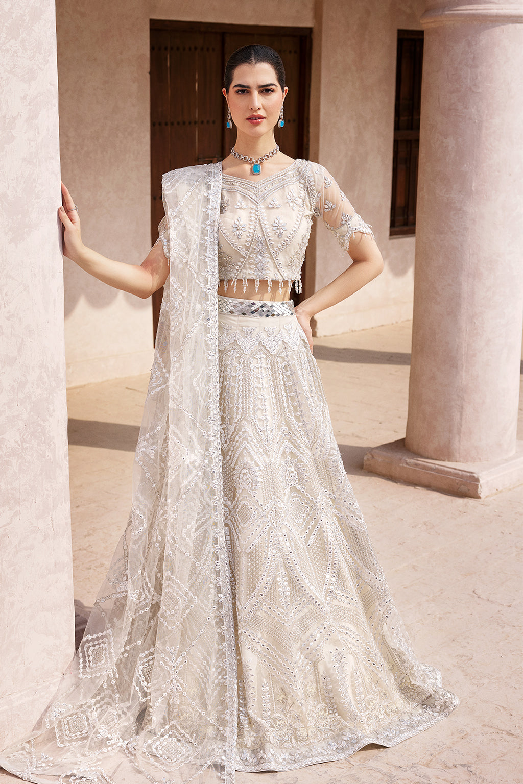 net Lehenga in Ivory