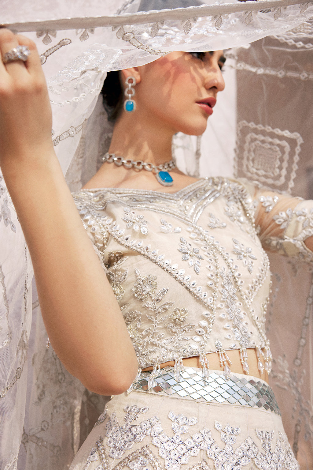 net Lehenga in Ivory