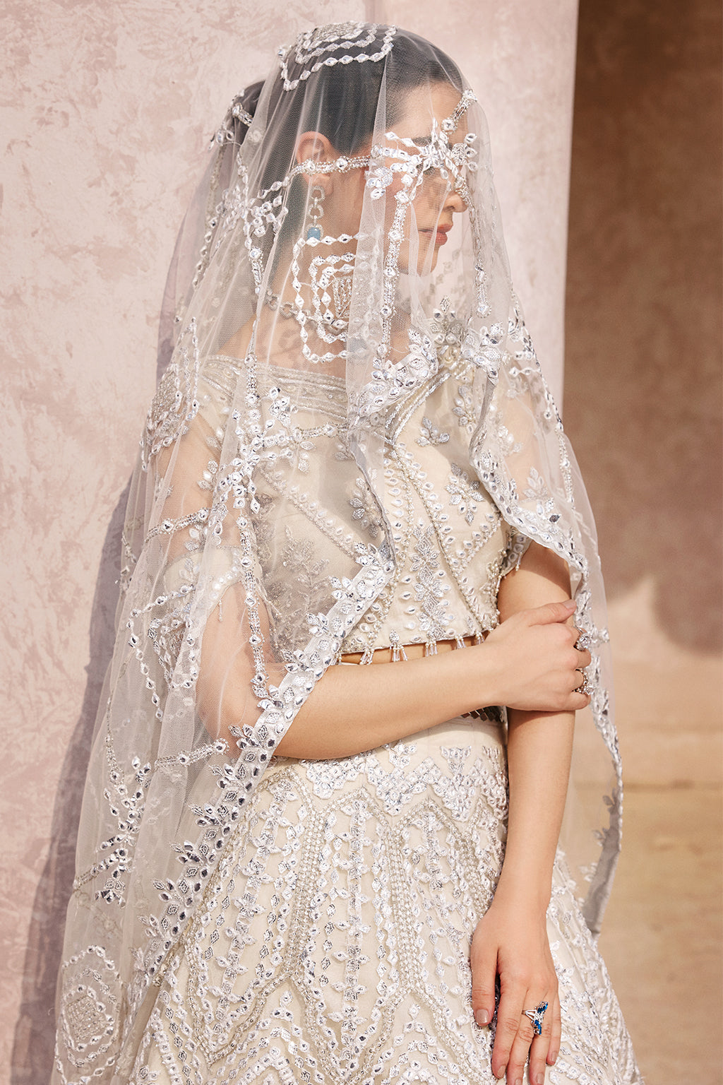 net Lehenga in Ivory