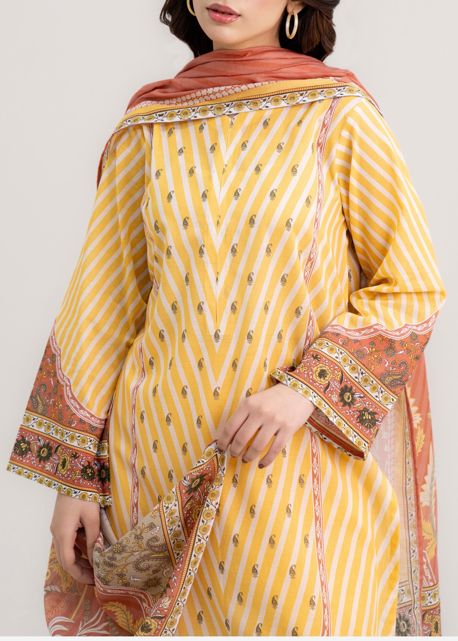 lawn Unstitched in Peach pink, yellow