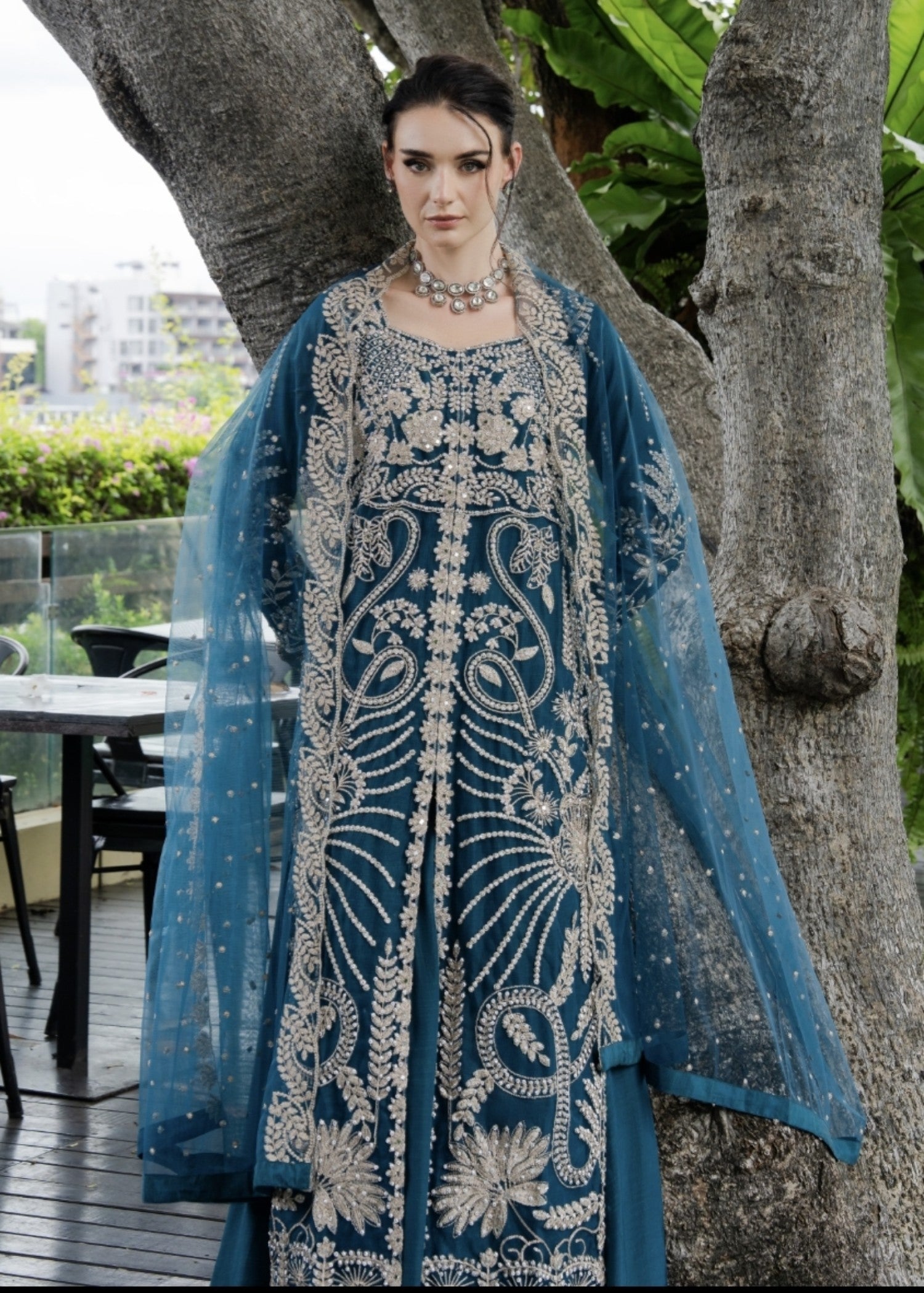 net Lehenga in Teal