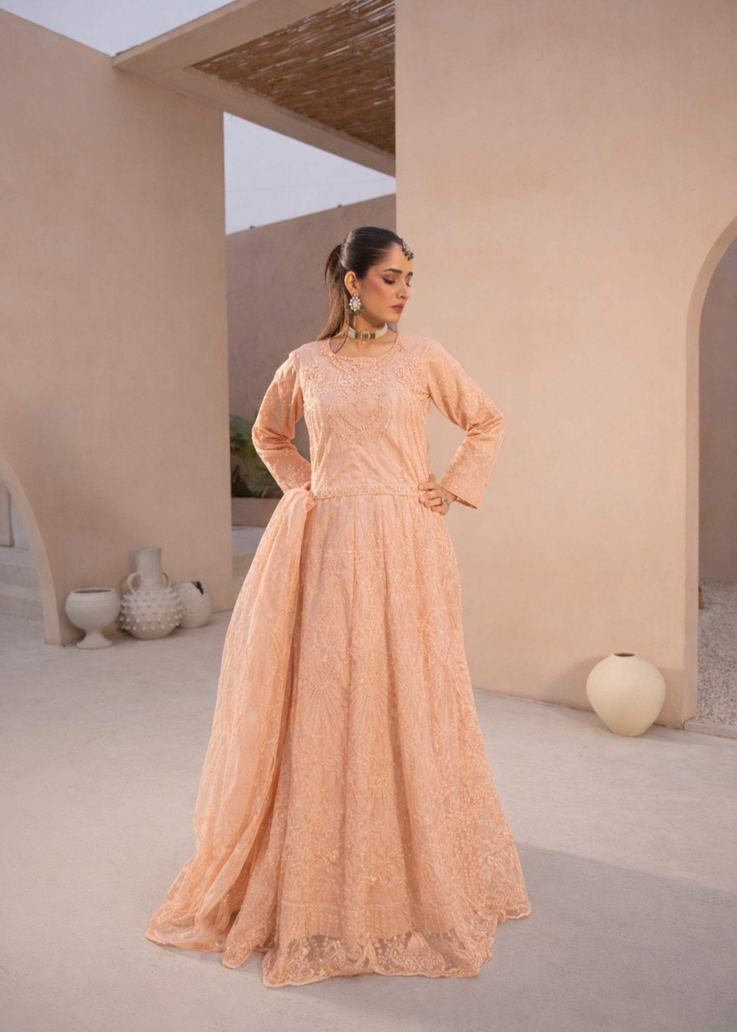 net Lehenga in Peach orange