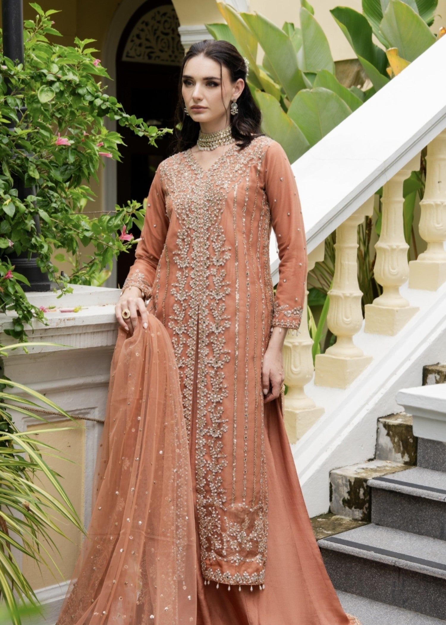net Lehenga in Coral orange