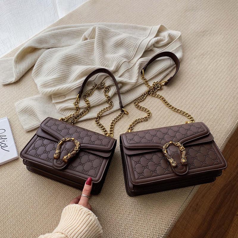 Inclined shoulder bag
