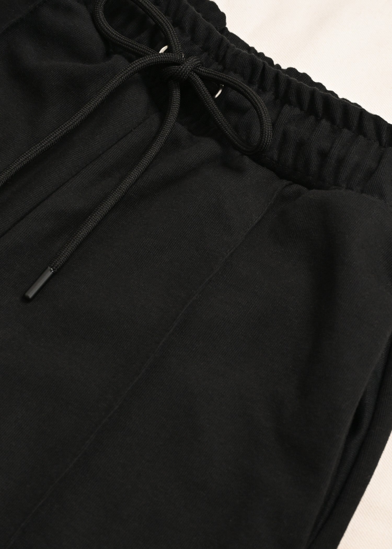 interlock knit Trousers in Black
