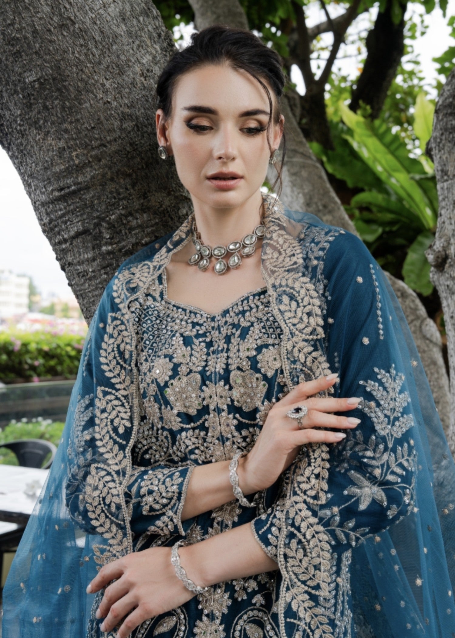net Lehenga in Teal
