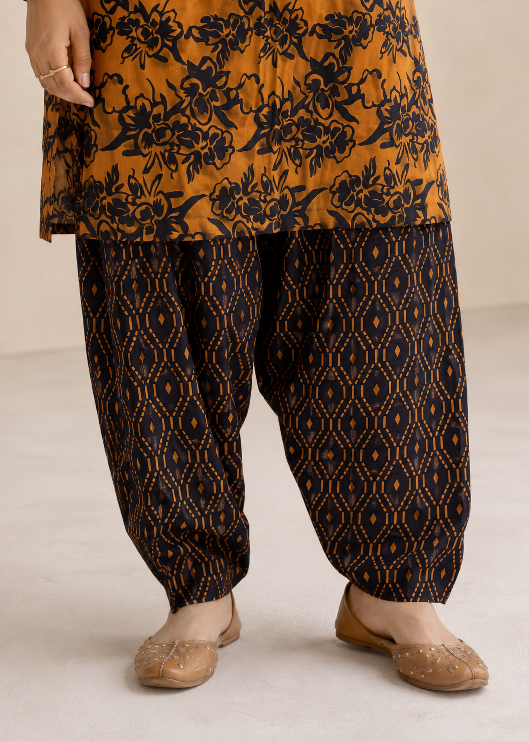 lawn Unstitched in Black, orange