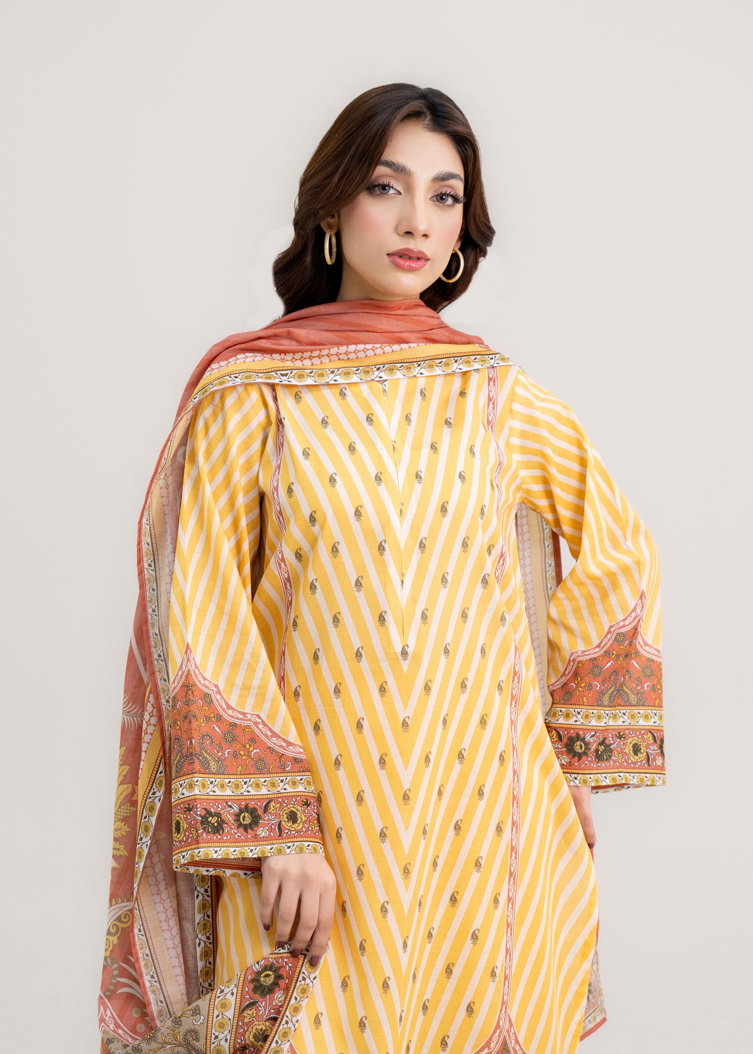 lawn Unstitched in Peach pink, yellow