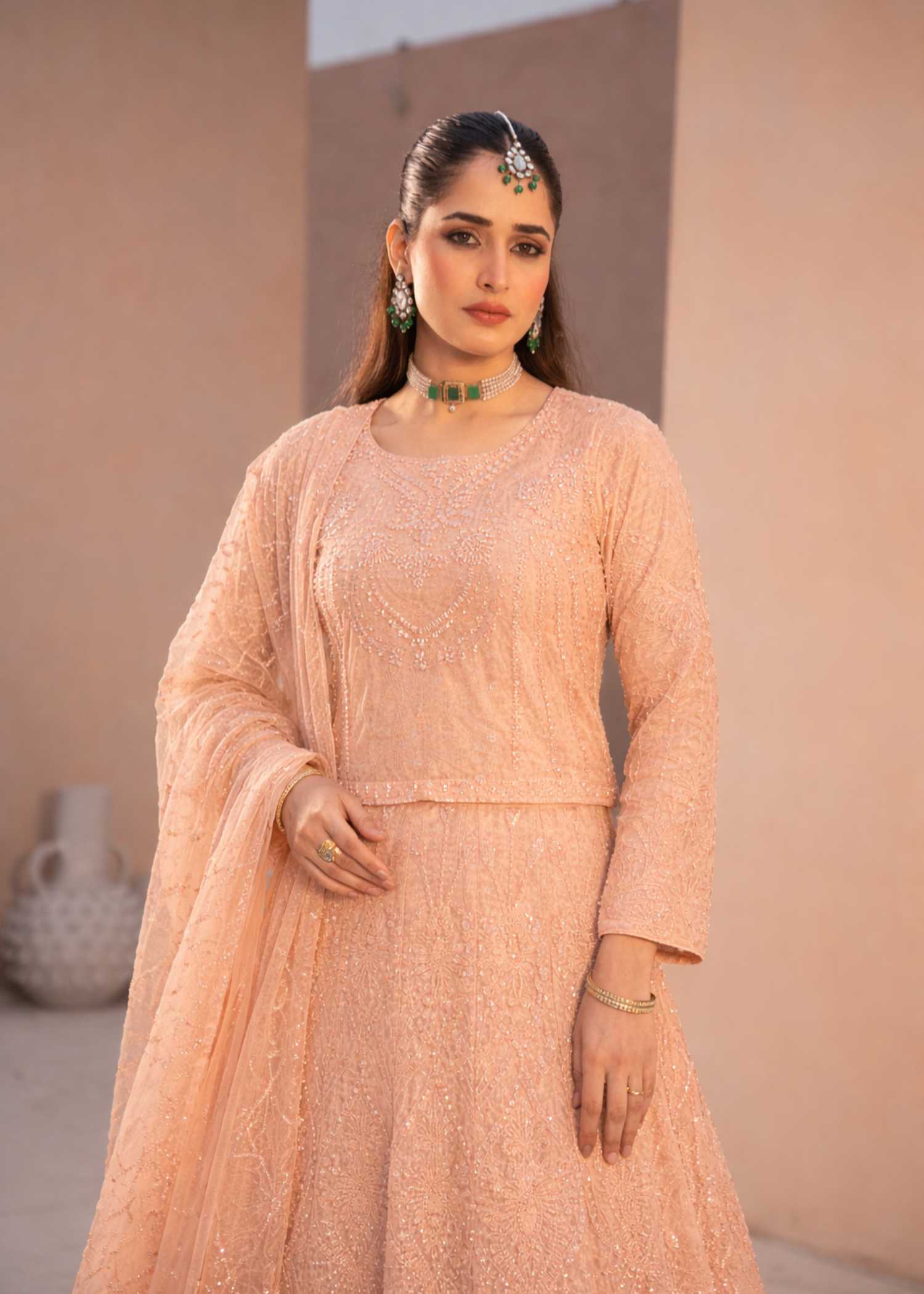 net Lehenga in Peach orange