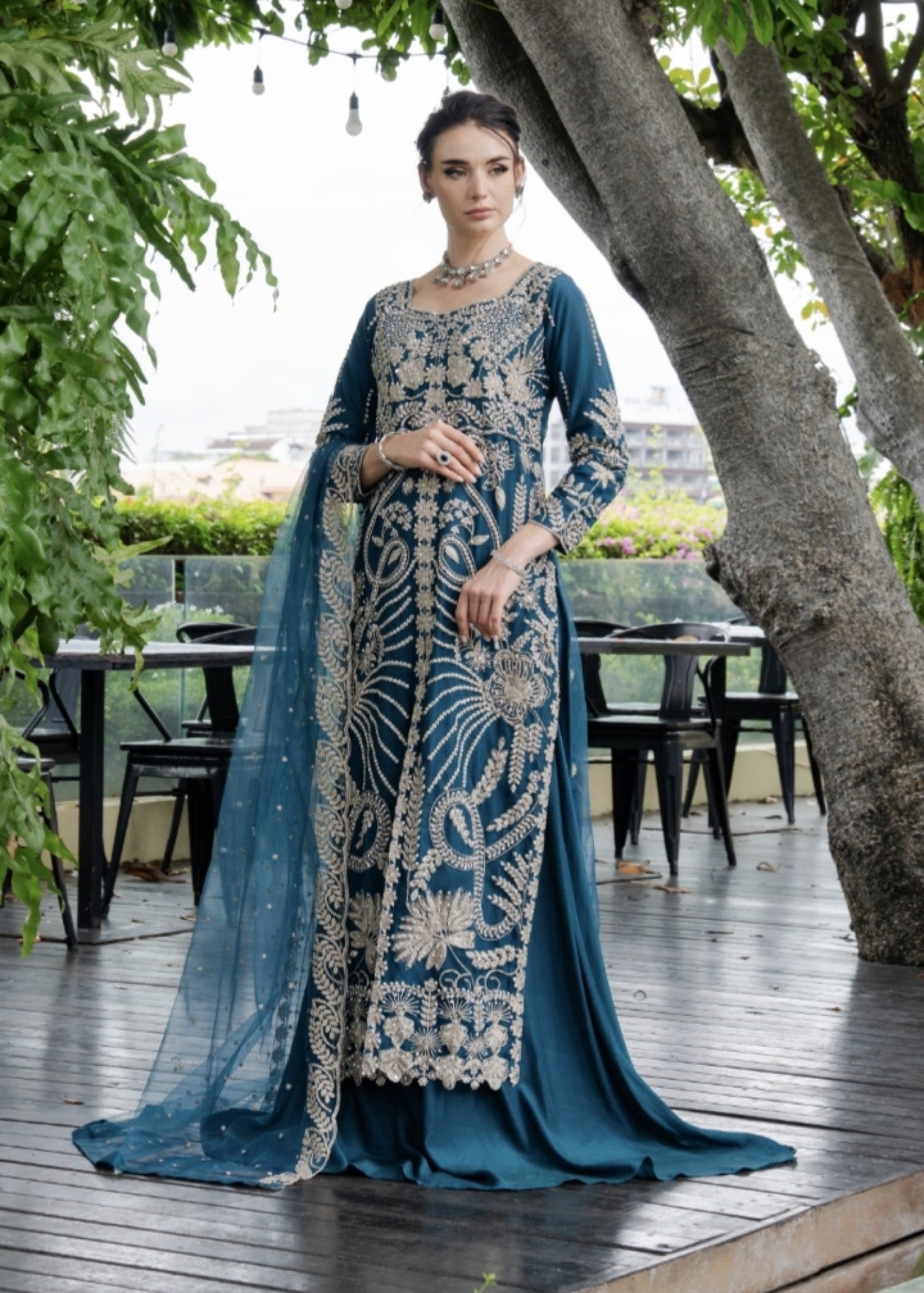 net Lehenga in Teal
