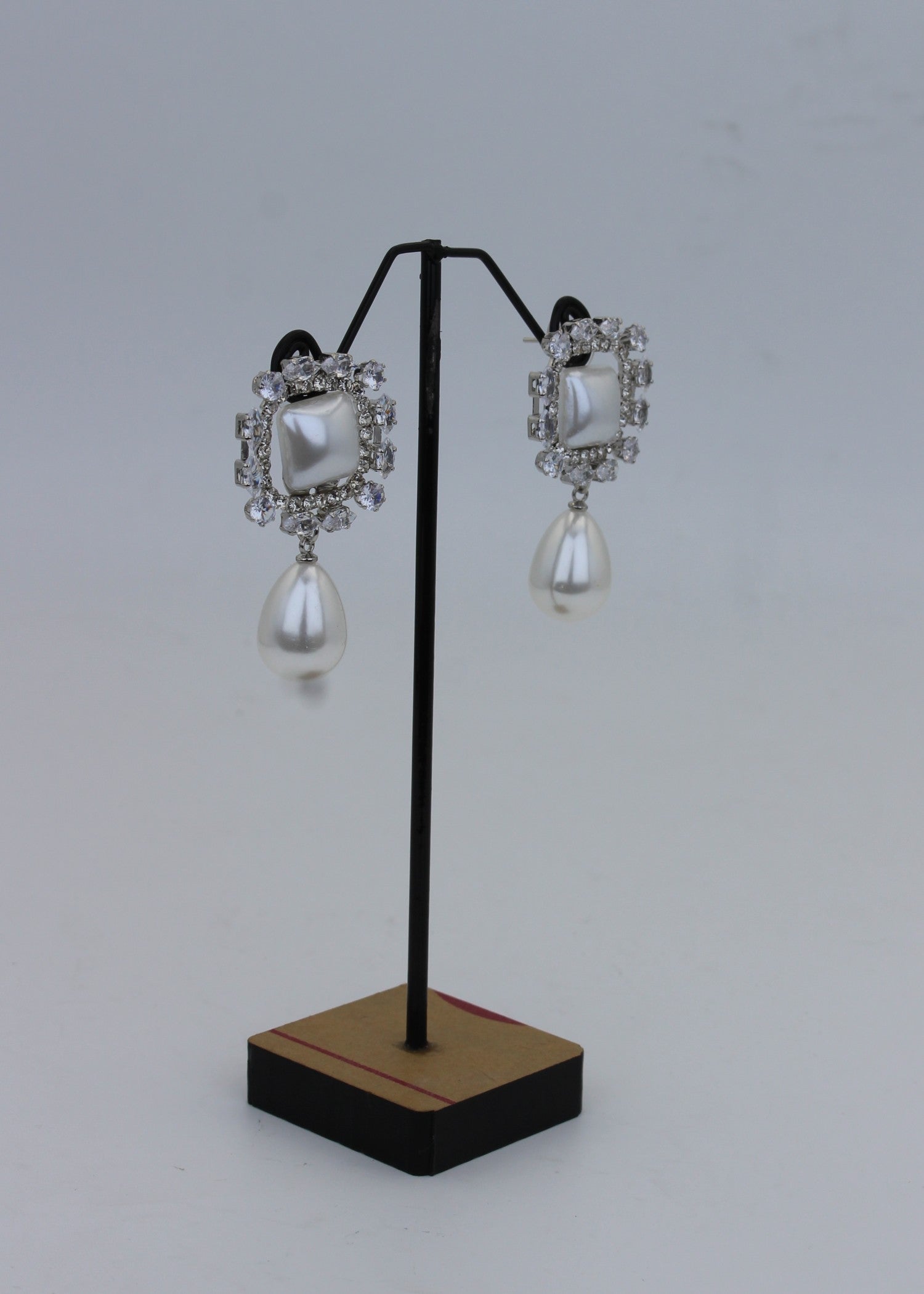 Earrings in White Color by - Trendy Women Earrings TMT3860