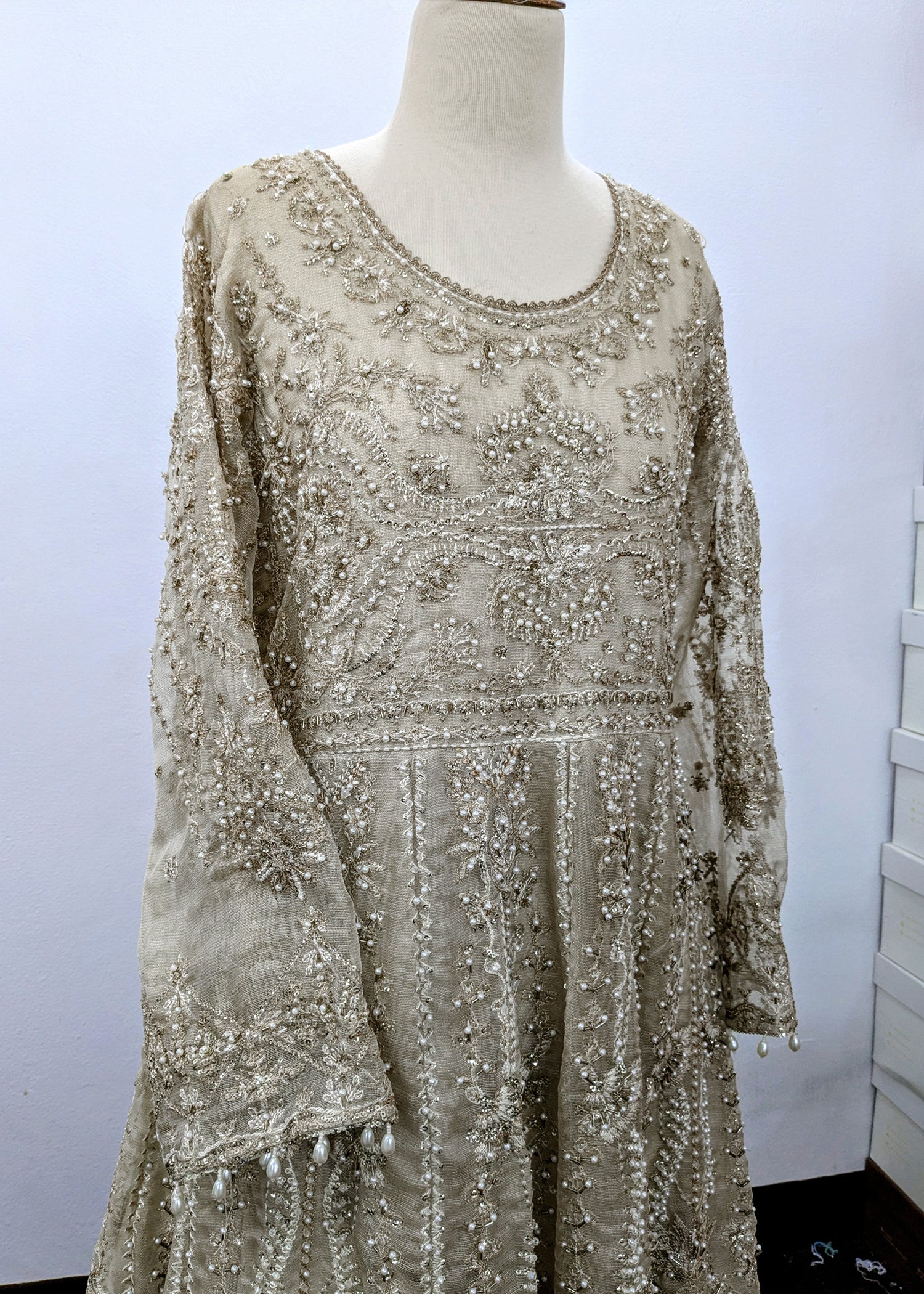 khaddi net Lehenga in Champagne