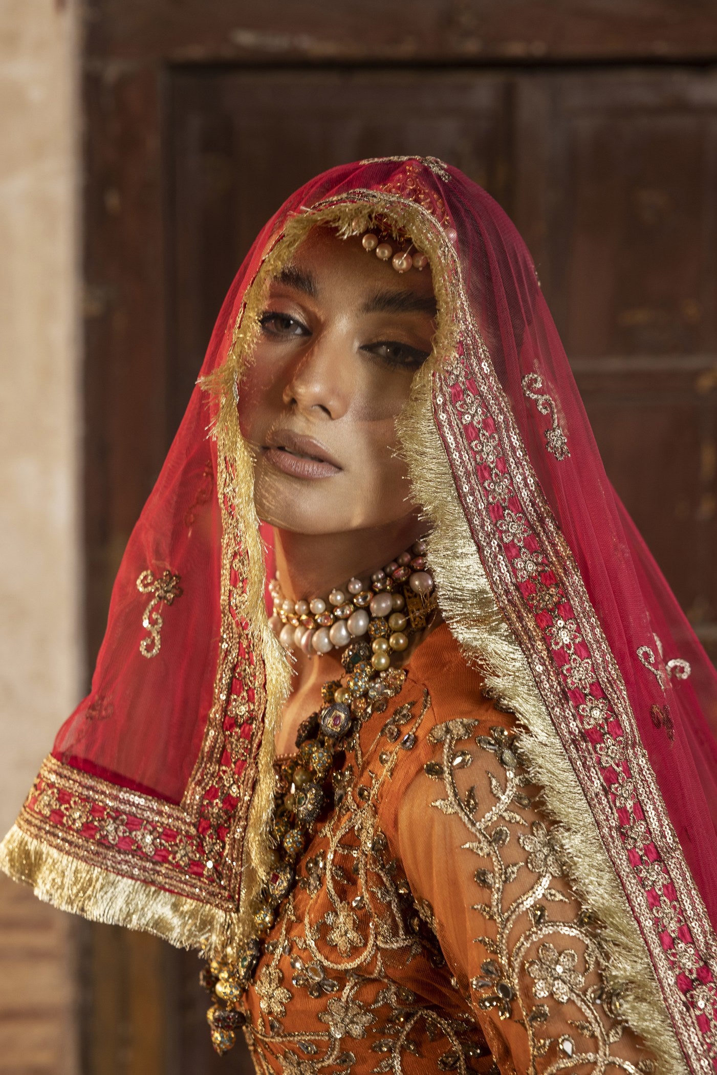 net Lehenga in Orange
