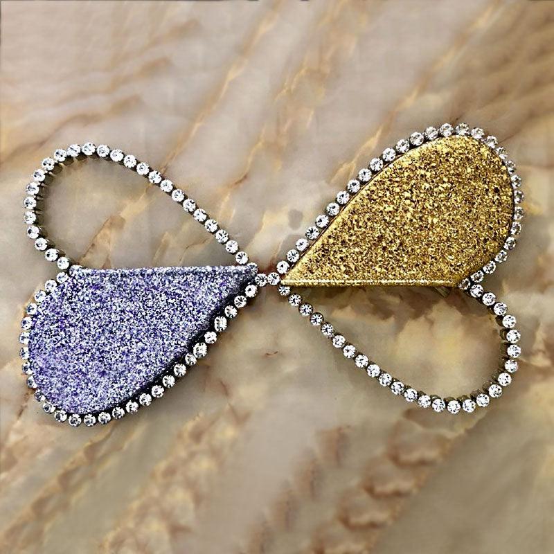 Diamond studded dinner bag with diamond heart-shaped clutch
