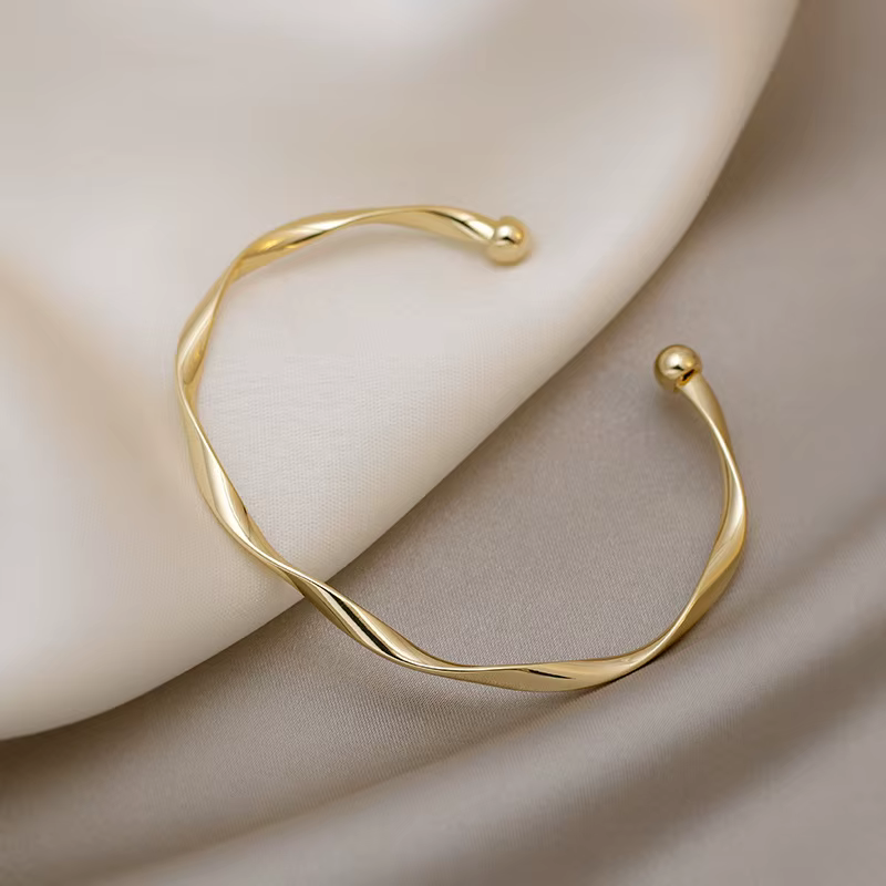 Golden Charm Bangles for Women Minimalism Fashion Twisted Couple Cuff  - charm bracelet kit at ShoplyHub