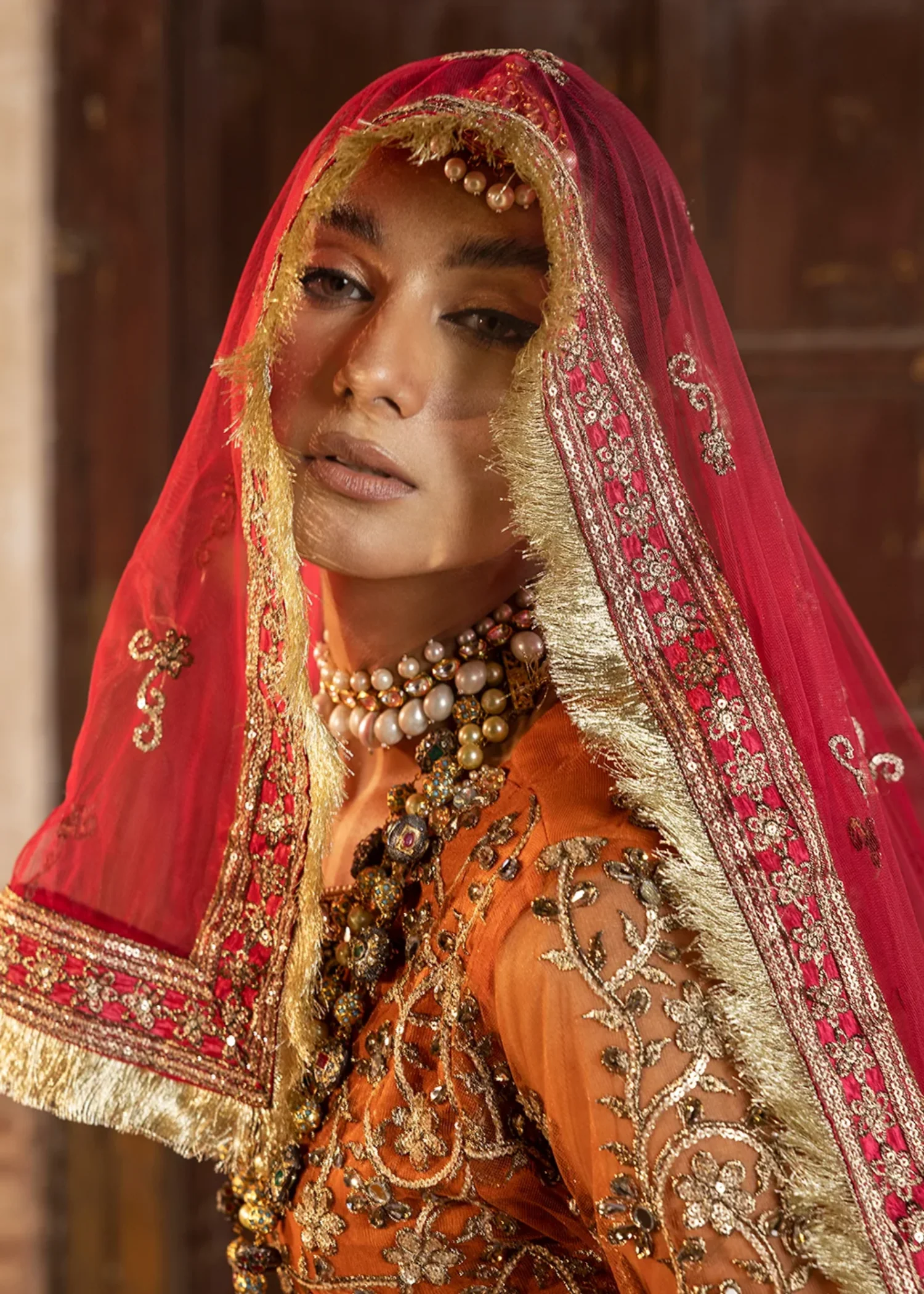 net Lehenga in Orange - view 5