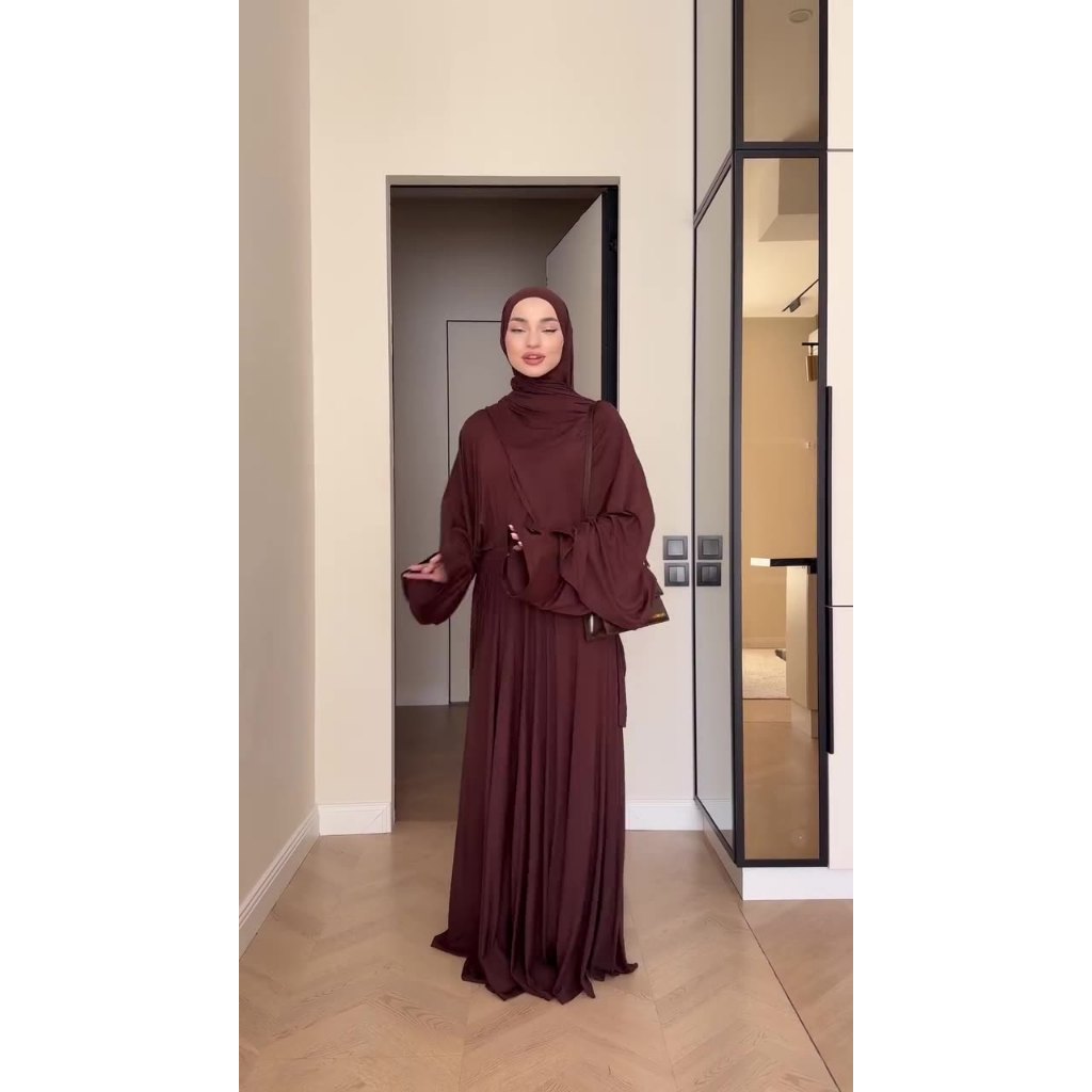 Muslim women's clothing new solid color long-sleeved top pleated long skirt suit